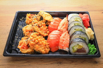 Colorful sushi set with pickled ginger and wasabi paste