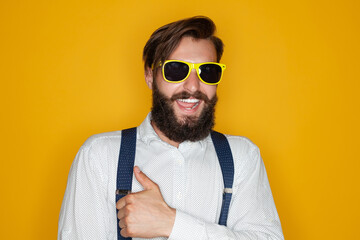 Fototapeta premium Exited hipster gesturing V sign