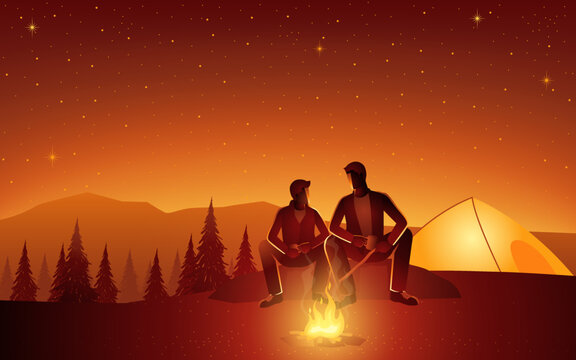 Father and son sitting together while camping by mountain