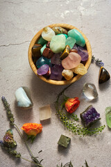 various gem stones in a wooden bowl