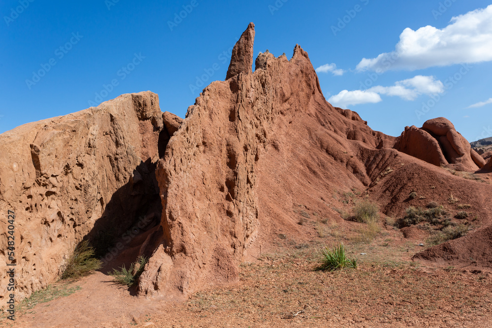 Poster fairytale canyon or skazka canyon, natural park of colorful rocks near issyk-kul lake, kyrgyzstan.