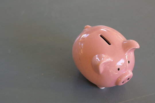 piggy bank on table with saving money concept.