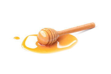 honey dripping from a wooden spoon