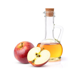 Apple cider vinegar in glass decanter bottle with red apple fruit isolated on white background.