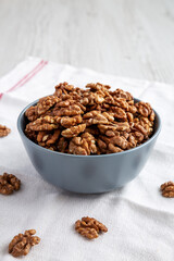 Raw Organic Walnuts in a Bowl, low angle view.