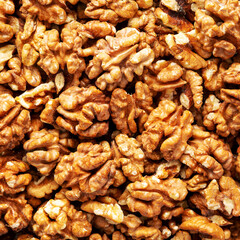 Raw Organic Walnuts background, top view. Flat lay, overhead, from above.