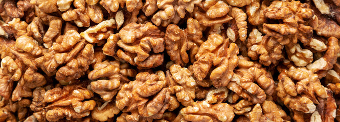 Raw Organic Walnuts background, top view. Flat lay, overhead, from above.