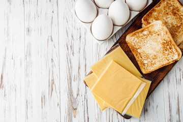 delicious cheese sandwich on a white rustic wooden background