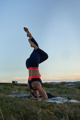 attractive woman practicing yoga and demonstrating healthy living. International day of yoga concept