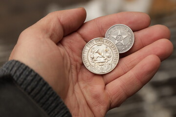Old rare silver soviet coins in hand