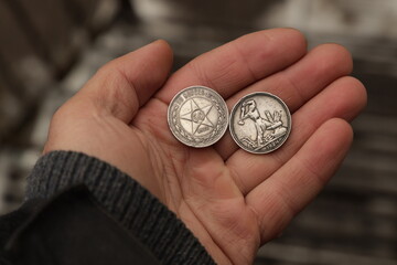 Old rare silver soviet coins in hand