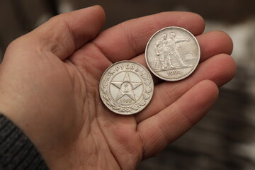 Old rare silver soviet coins in hand