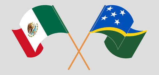 Crossed and waving flags of Mexico and Solomon Islands