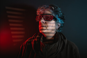 Senior woman in futuristic outfit