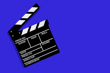 Fototapeta na wymiar Movie clapperboard for shooting videos and movies on a blue background copy space