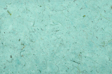 The Green colour mulberry paper texture as background.