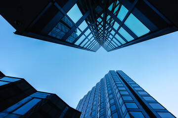 Fototapeta na wymiar Looking up at modern skyscrapers in London, England.