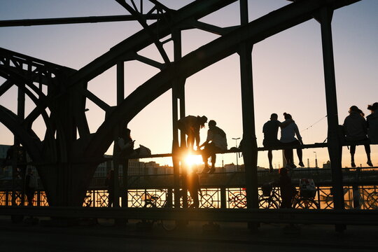lovers at sunset on the bridge