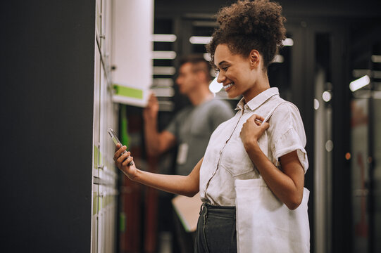 Two Office Workers Opening Their Section Lockers