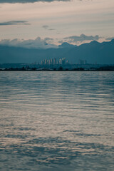 skyline of Vancouver in front of the Mountains,