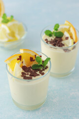 Orange lemon citrus milk mousse in glasses