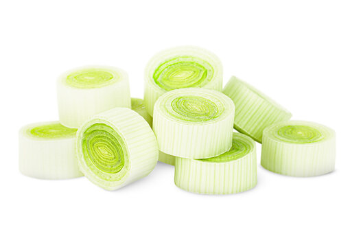sliced leek on a white isolated background, front view