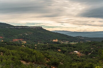 Beautiful view of the green vale and cloudy sky. Lac Zola, France.