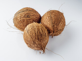 fresh natural coconut on white acrylic background