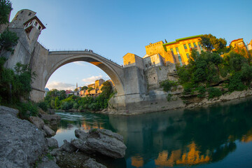 A beautiful view of the old bridge across the Neretva River in Mostar, Bosnia and Herzegovina, on a...