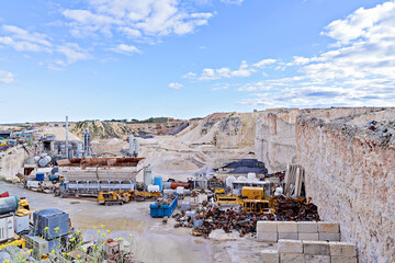 Panoramic view of limestone quarry of Malta. with tilt-shift effect. Environmental destruction concept