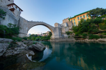 A beautiful view of the old bridge across the Neretva River in Mostar, Bosnia and Herzegovina, on a...