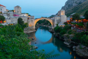 A beautiful view of the old bridge across the Neretva River in Mostar, Bosnia and Herzegovina, on a...