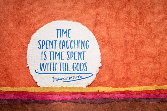 time spent laughing is time spent with the gods, Japanese proverb - inspirational writing against abstract paper landscape