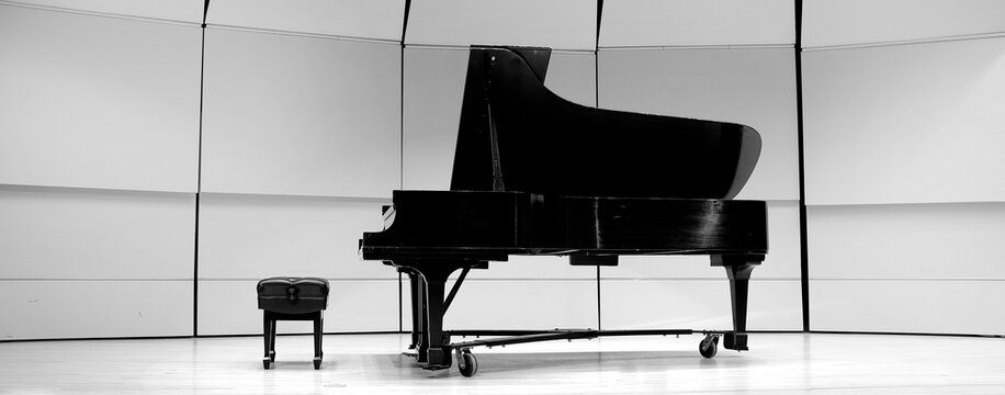Black and White Piano on Concert Stage for Performance Drama Music