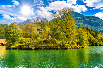 Small island with trees in the lake Koenigssee, Konigsee, Berchtesgaden National Park, Bavaria, Germany