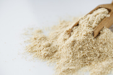 asafoetida aromatic powder on a white acrylic background