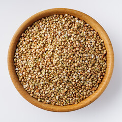 organic raw green buckwheat on a white background