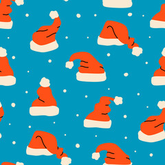 Santa`s hats vector seamless pattern. Retro, vintage style. Red Santa cap for textile print or wrapping paper. New year, Merry Christmas print design in hand drawn style