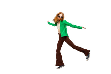 Fototapeta na wymiar Cute ginger teenager girl jumping isolated over white background. Cute young woman dancing in air. Copy space. PNG