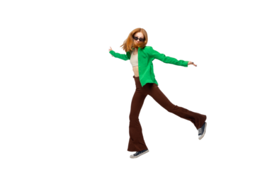 Cute ginger teenager girl jumping isolated over white background. Cute young woman dancing in air. Copy space. PNG
