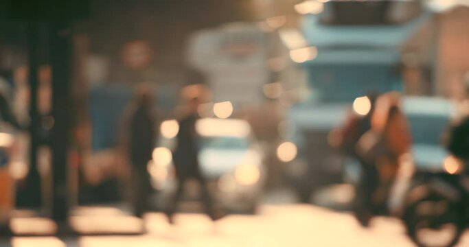 Blurred crowd, people walking and traffic in city, street or urban road. Travel, cars and commute of pedestrians crossing on asphalt pavement, sidewalk or crosswalk in busy town or metropolis area.