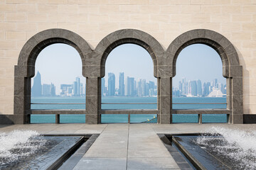 View of Doha skyline, Qatar, through the arcade.