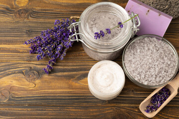Lavender flowers and fragrant sea salt, handmade soap and body cream. The concept of spa, beauty and health salon, skin care cosmetics. Natural cosmetics.Aroma procedures. Close-up on the background.