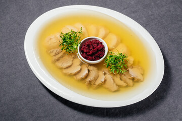 Restaurant serving of jelly with horseradish. Restaurant and food concept.