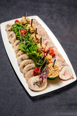 Top view of delicious sliced chicken roll soaked in Chinese wine named drunken shrimp for lunar new year's dishes.