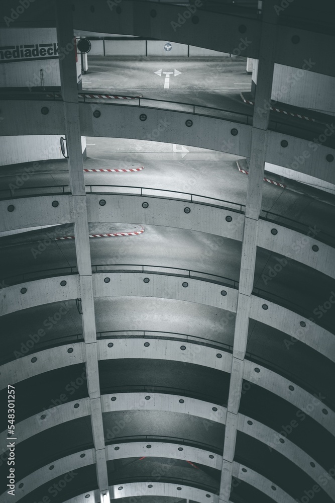 Aufkleber vertical shot of a building block with multiple floors for parking lots