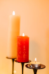 Composition of glasses, candles and decorative elements. New Year's mood