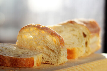 sliced wheat bread. morning mood for breakfast, bread as a traditional meal