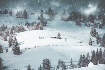 Wooden houses under snow