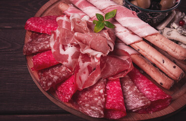 Appetizer, assortment, set, sausage, and cheese, on a wooden board, top view, no people,